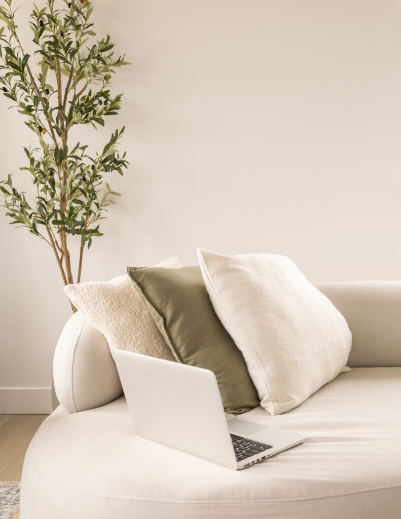 olive tree, couch and laptop for blogging at home: what is content strategy