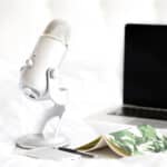 a microphone and laptop used for blogging to make money