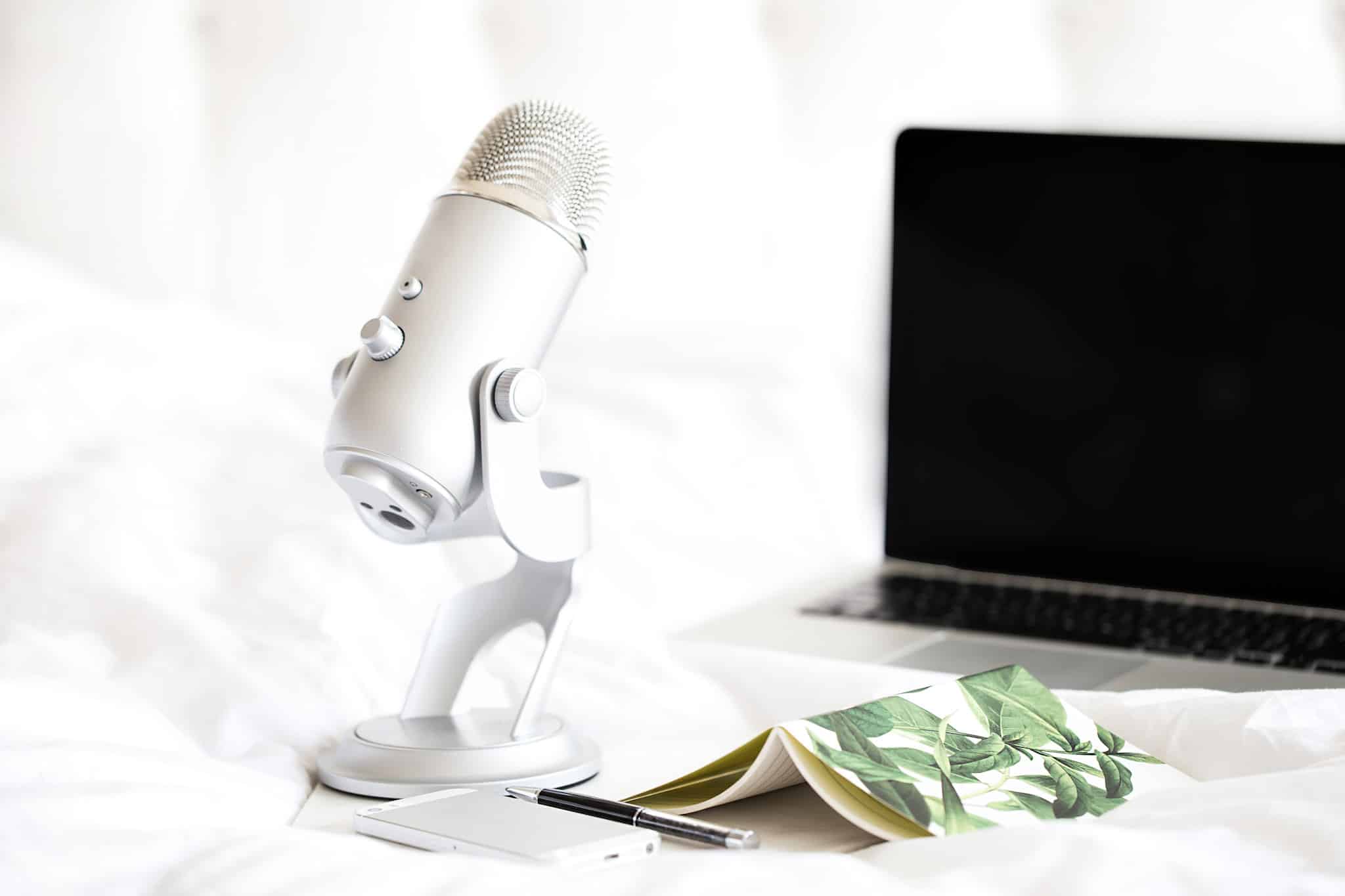 a microphone and laptop used for blogging to make money