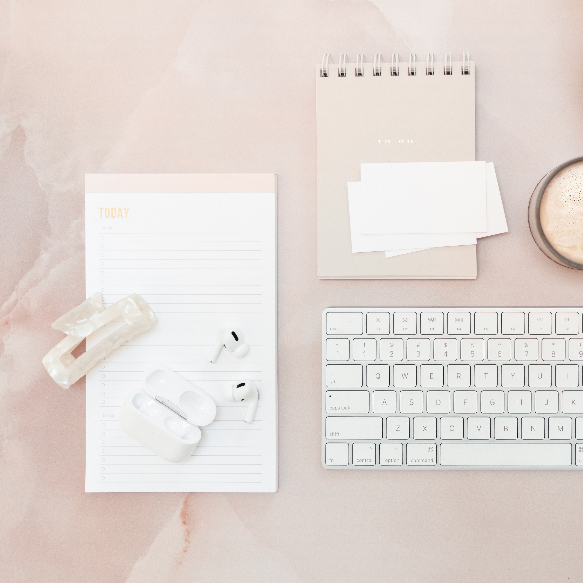 essential blogging tools like a keyboard, note pads, and earphones