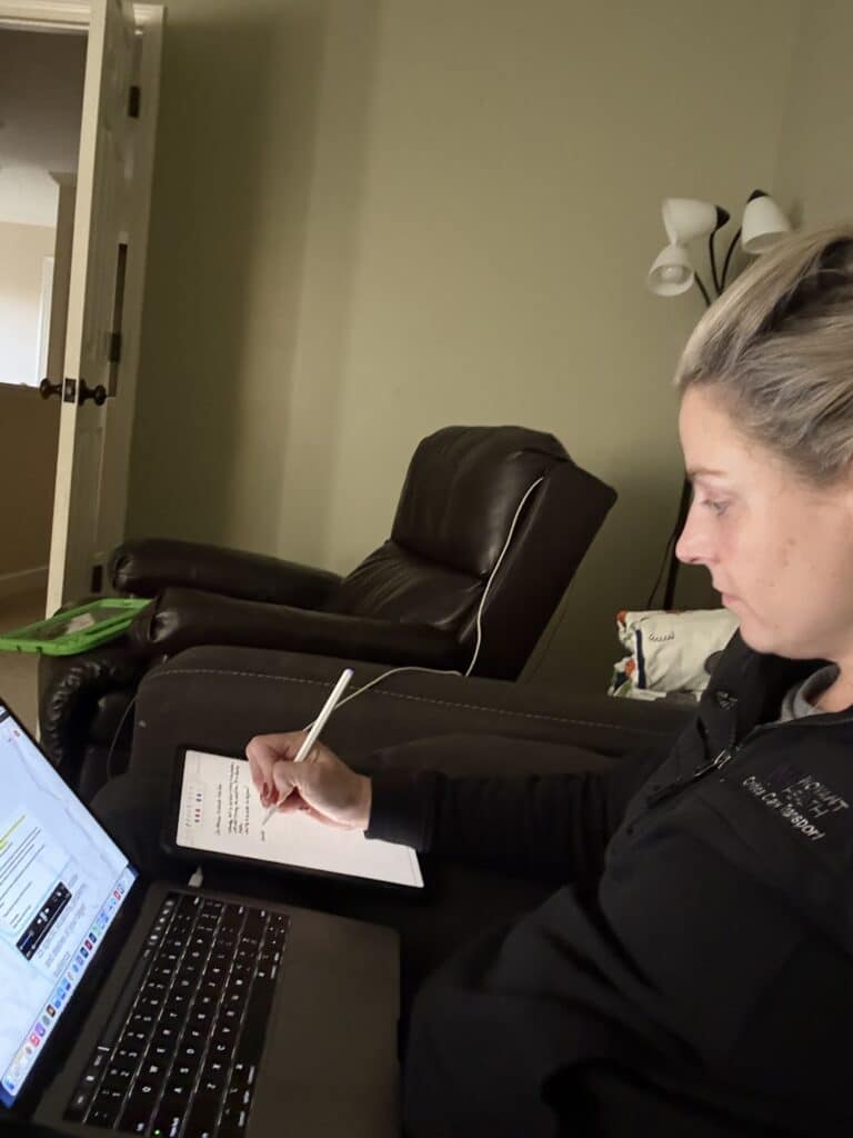sarah grace vogler, the author, using her best blogging tools like the macbook and ipad.