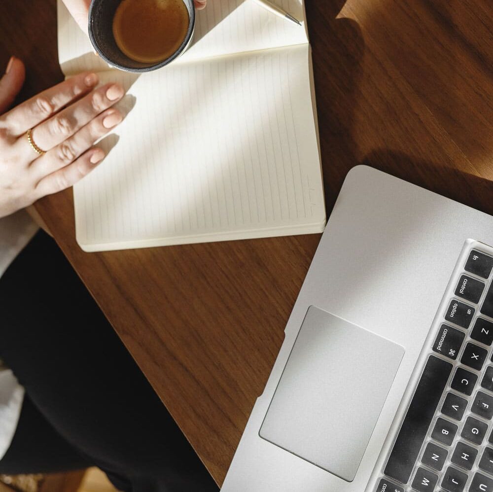 person researching on computer "is it too late to start a blog in 2026?"
