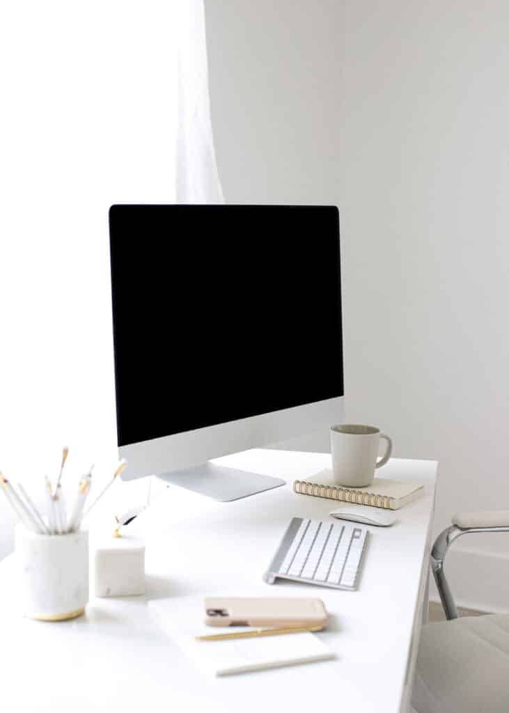desktop computer with common website design mistakes